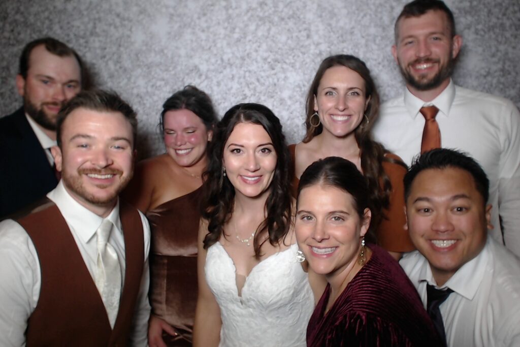 Wedding party posing in the photo booth