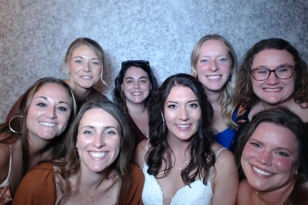 Bride and bridesmaids in the photo booth