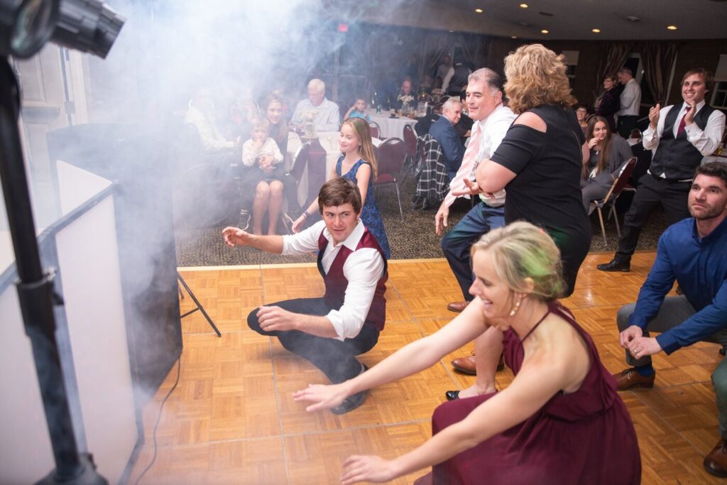 Packed dance floor at a wedding reception